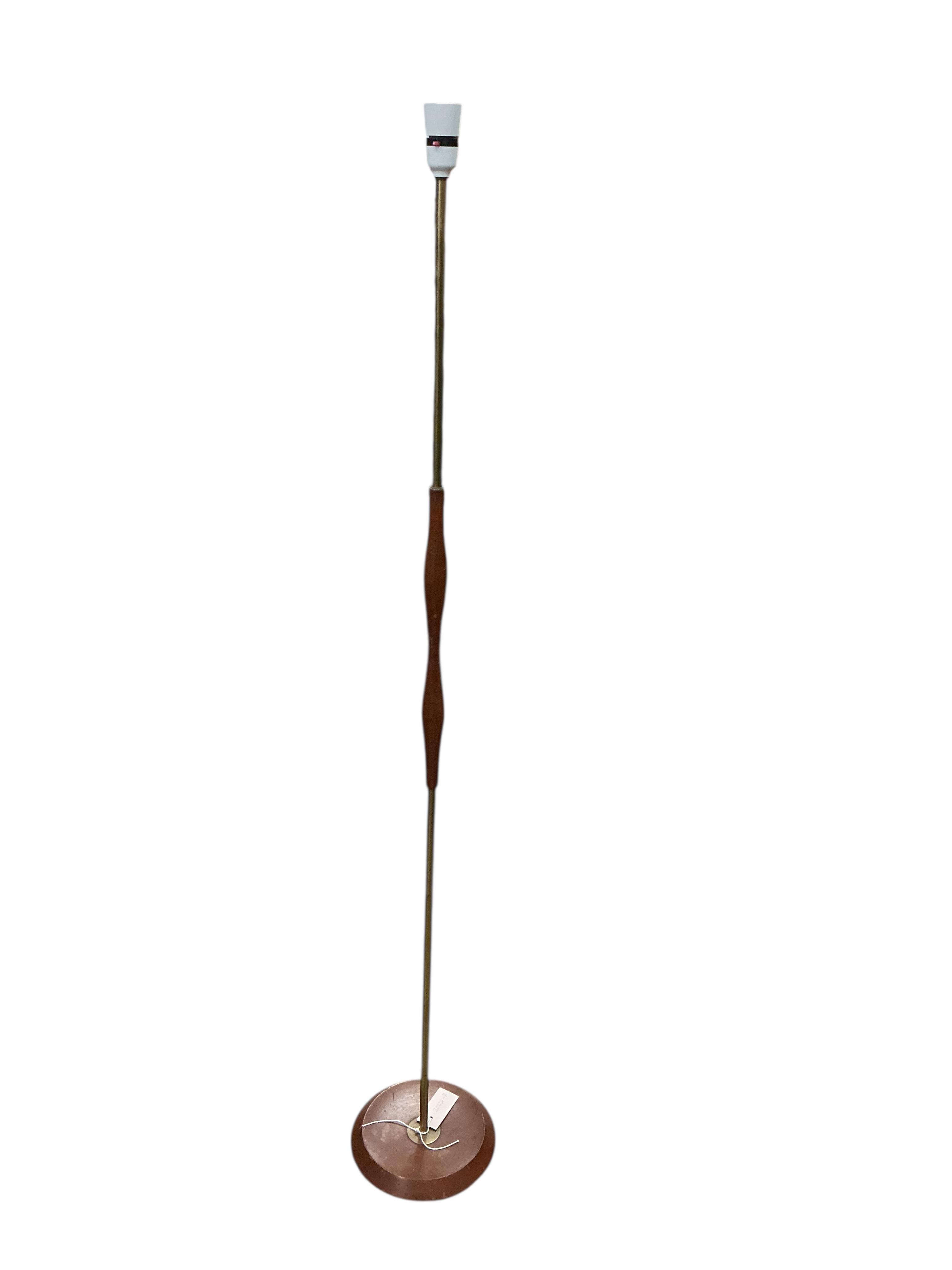 A mid century teak and brass standard lamp, height 146cm